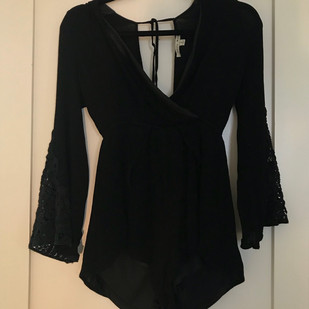 V-neck romper with crochet sleeves